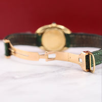 Cartier Baignoire, 18k Gold on Green Leather