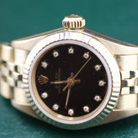 Rolex Ladies DateJust 26mm, 18k Yellow Gold, Black Diamond Dial (Ref. 67197)