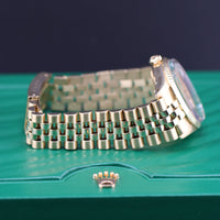 Rolex Oyster Perpetual Date, 18k Yellow Gold on Jubilee (Ref. 15037)