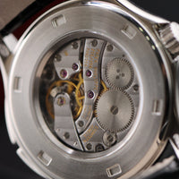 Patek Phillipe Travel Time, White Dial Platinum (Ref. 5134P)