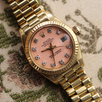 Rolex Ladies DateJust 26mm Pink Stella Diamond Dial, President Bracelet (Ref. 69173)