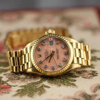 Rolex Ladies DateJust 26mm Pink Stella Diamond Dial, President Bracelet (Ref. 69173)