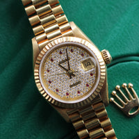 Rolex 26mm DateJust, Pavé Ruby Dial, President (Ref. 69178)