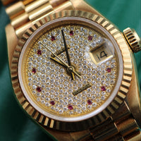 Rolex 26mm DateJust, Pavé Ruby Dial, President (Ref. 69178)