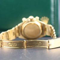 Rolex Daytona, Yellow Sigma Dial, Oyster Riveted Bracelet 18k Gold (Ref. 6265)