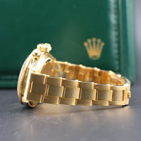 Rolex Daytona, Yellow Sigma Dial, Oyster Riveted Bracelet 18k Gold (Ref. 6265)