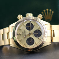 Rolex Daytona, Yellow Sigma Dial, Oyster Riveted Bracelet 18k Gold (Ref. 6265)