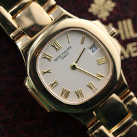 Patek Philippe Nautilus 27mm, 18k Yellow Gold, White Roman (Ref. 4700/51J)