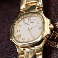 Patek Philippe Nautilus 27mm, 18k Yellow Gold, White Roman (Ref. 4700/51J)