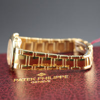 Patek Philippe Nautilus 27mm, 18k Yellow Gold, White Roman (Ref. 4700/51J)