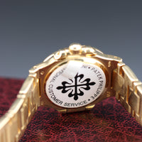 Patek Philippe Nautilus 27mm, 18k Yellow Gold, White Roman (Ref. 4700/51J)