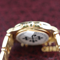 Patek Philippe Nautilus 27mm, 18k Yellow Gold, White Roman (Ref. 4700/51J)