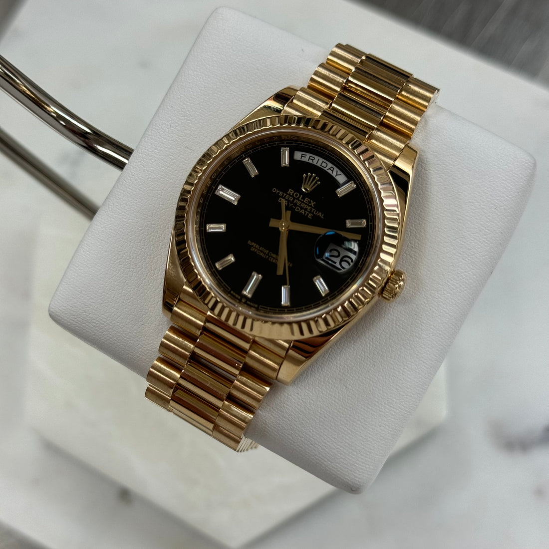 Rolex Day-Date 40 Black Baguette Diamond 228238a