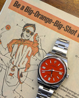 Rolex Oyster Perpetual Coral Red Dial (Ref. 124300)