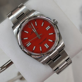 Rolex Oyster Perpetual Coral Red Dial (Ref. 124300)