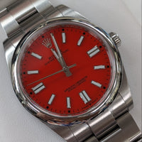 Rolex Oyster Perpetual Coral Red Dial (Ref. 124300)