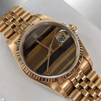 Rolex DateJust, Tigers Eye Dial, 18k Yellow Gold on Jubilee (Ref. 16018)